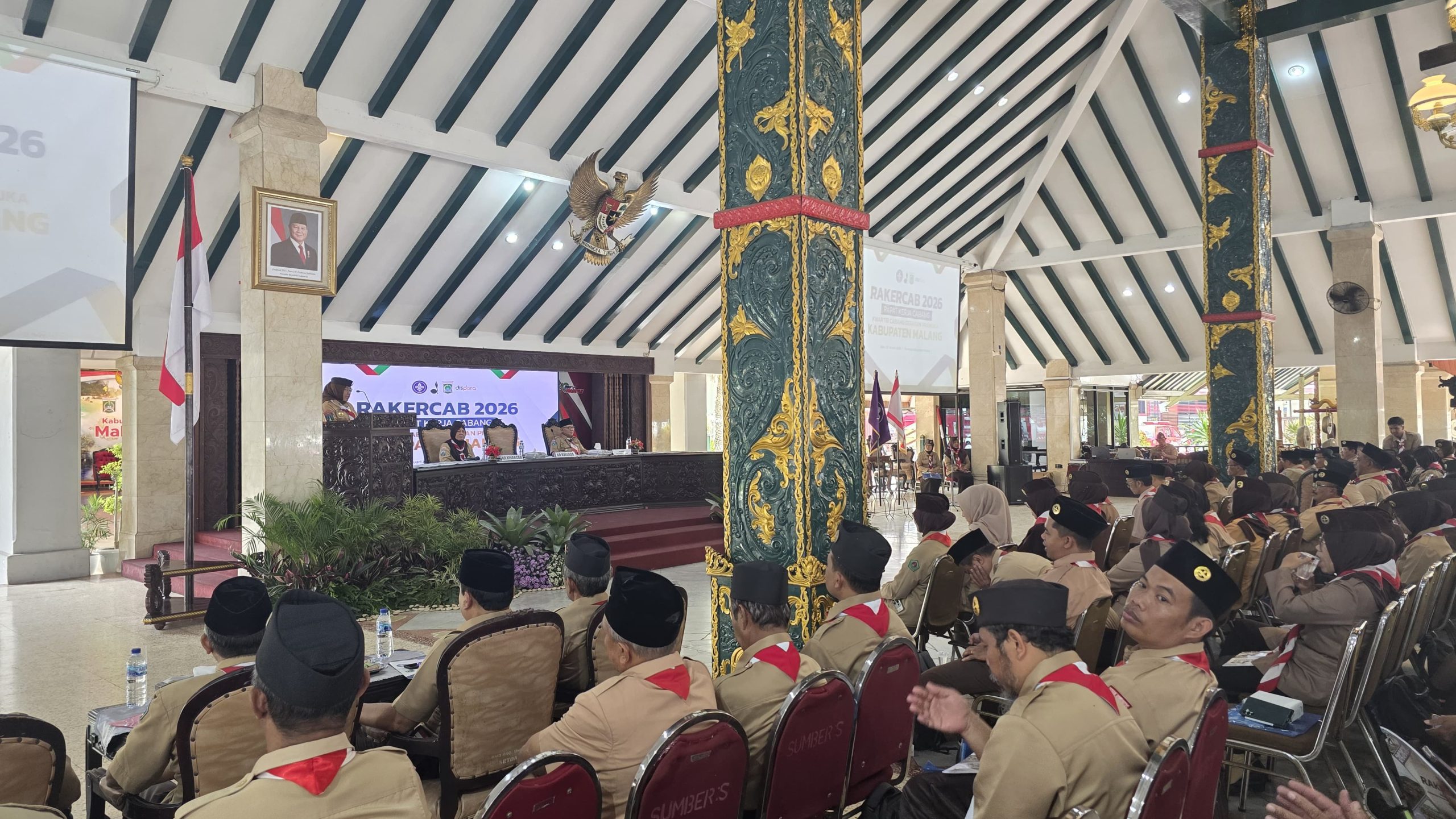 Suasana Rapat Kerja Cabang (Rakercab) Gerakan Pramuka Kabupaten Malang 2026 di Pendopo Kabupaten Malang, dihadiri jajaran pengurus Kwarcab, Kwartir Ranting, Dewan Kerja, serta perwakilan Kwarda Jawa Timur.